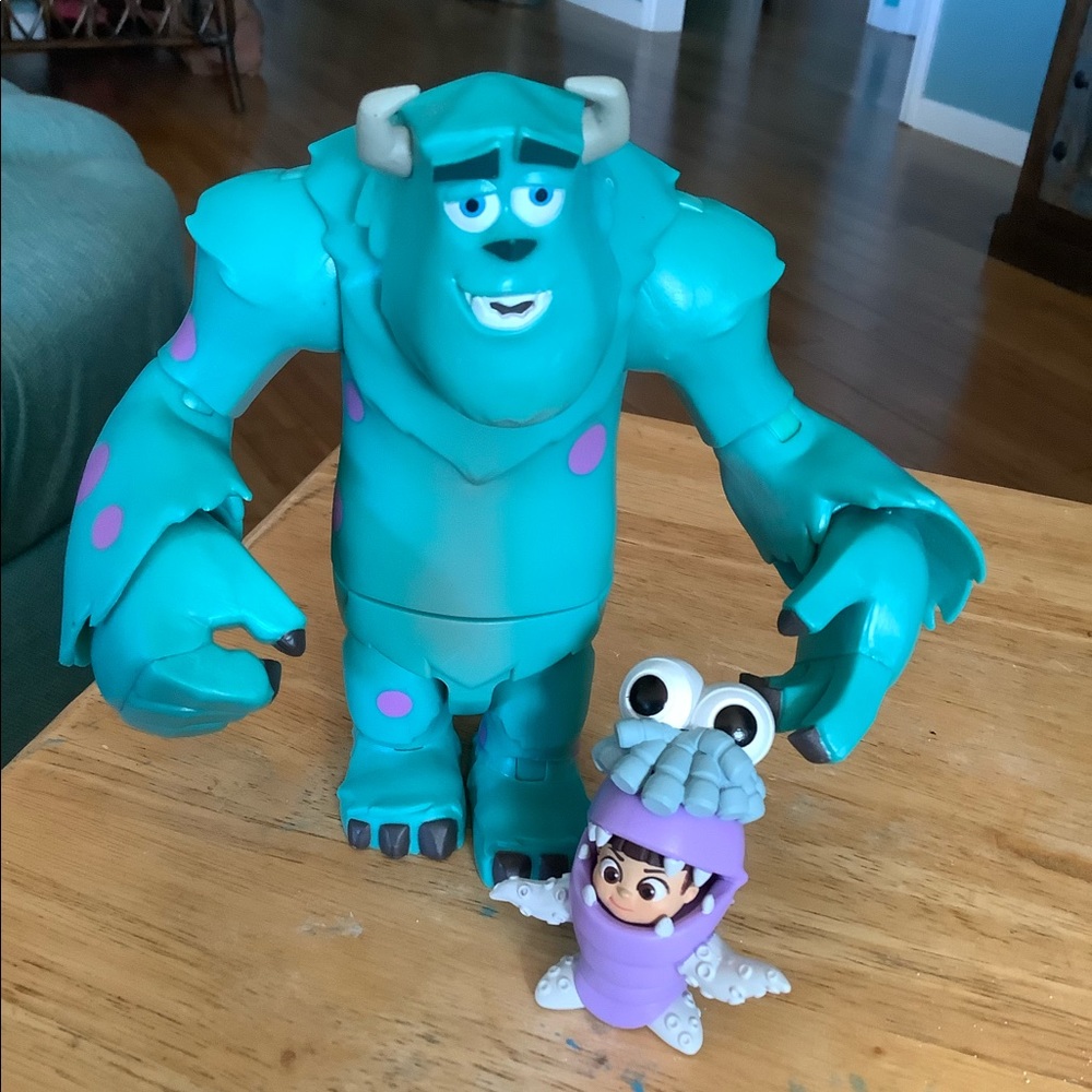 Sully and Boo Disney figures. Sully is poseable.